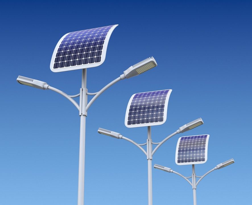Solar street lights against a blue sky